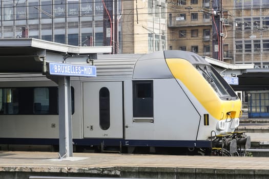 Rail tracks and trains in the Brussels South Railway Station