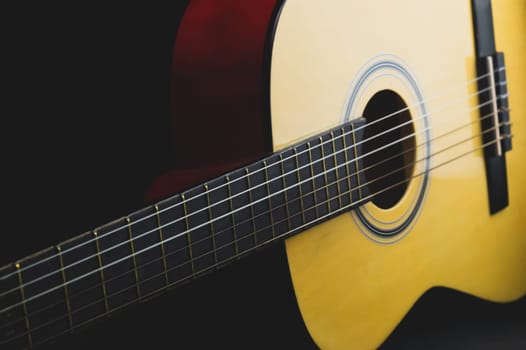 Guitar close up. musical instrument. strings on the guitar fretboard