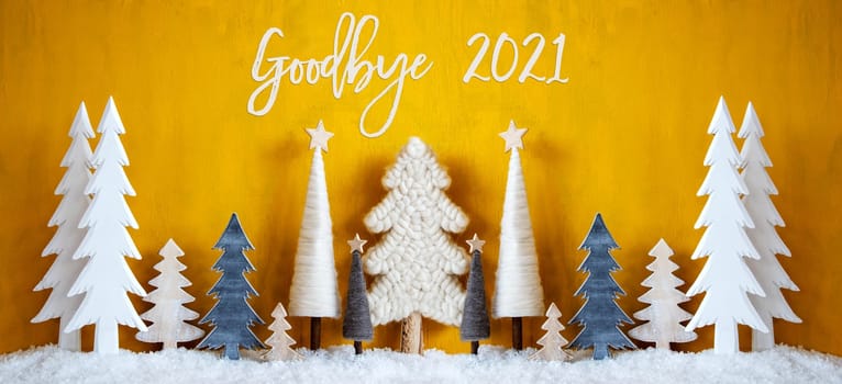 Banner Of Christmas Trees With English Calligraphy Goodbye 2021. Yellow Wooden Rustic Background With Snow. Christmas Decoration With Stars.