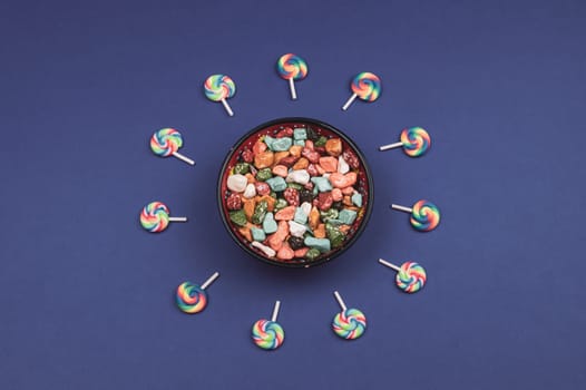 Lollipops and candies. candy bowl with sweets in the form of colored stones. copy space