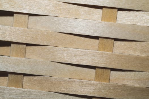 Wooden weaving background. wood wickerwork texture