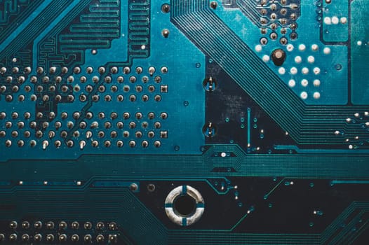Dusty circuit board abstract background. computer motherboard close up. modern technologies. micro elements of computer with connections and traces. Intelligent technology
