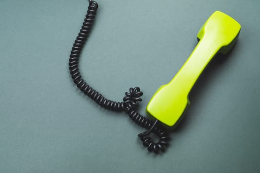 Telephone handset. phone receiver isolated on color background. old communication technology. copy space