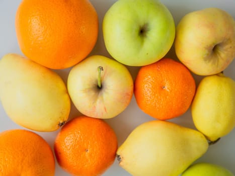 Fruits lie on a white background. High quality photo