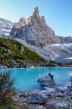 The frozen Sorapiss lake and majestic Dolomites Alp Mountains, province of Belluno, Italy