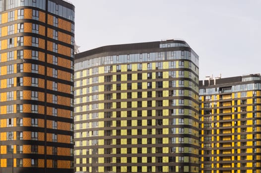 Modern building wall. detail of new constructed colorful building. modern residential construction