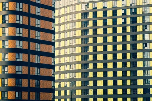 Modern building wall. detail of new constructed colorful building. modern residential construction