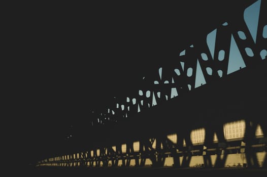 Metal bridge silhouette perspective view. industrial background