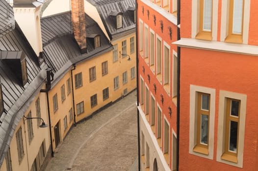 Old street with traditional houses in Stockholm, Sweden. european architecture