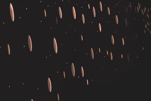 Sparkling lights on a black background. abstract backdrop with blinking lights