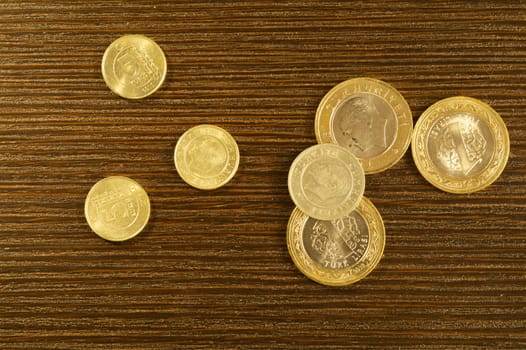 Turkish coins on a dark wooden background. lira from Turkey close up