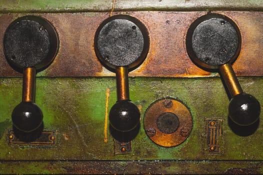Old lathe. detail of rusty machine. metal mechanism. vintage metalworking machine close up. abstract industrial background