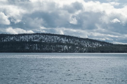 Mountains and water. landscape with lake and hills. seascape with cloudscape