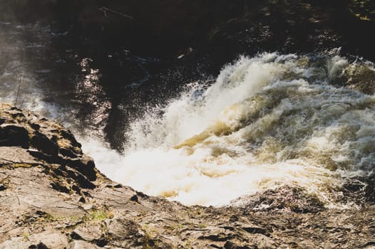 Waterfall nature background. rushing stream water. rocky flowing river