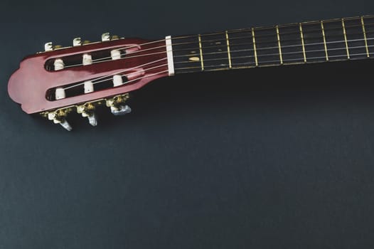 Guitar fretboard close up. musical instrument. strings on the guitar neck. copy space