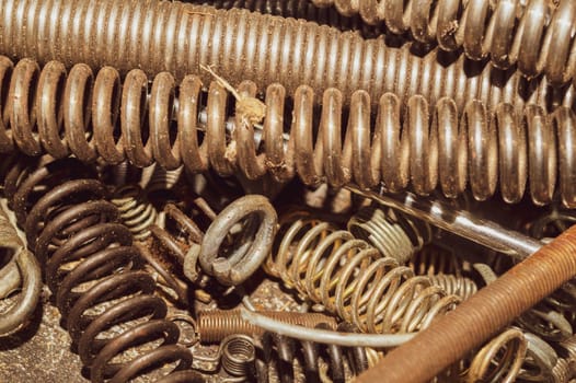 Metal rusty springs. pile of absorbers. industrial concept. work tool