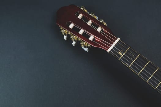 Guitar fretboard close up. musical instrument. strings on the guitar neck. copy space