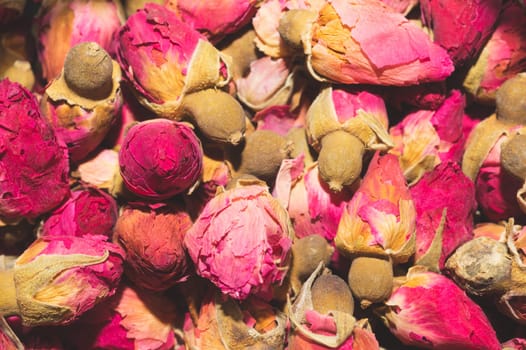 Dried rose buds close up. herbal tea ingredient