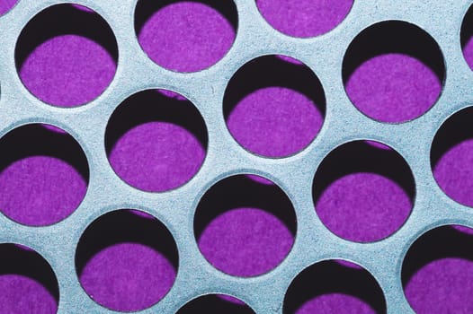 Steel plate with holes. metal grid with round cells. modern background. iron mesh