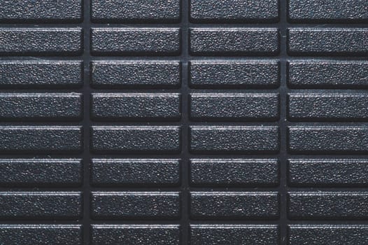 Black plastic texture. ribbed background