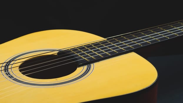 Acoustic guitar close up. musical instrument. strings on the guitar fretboard