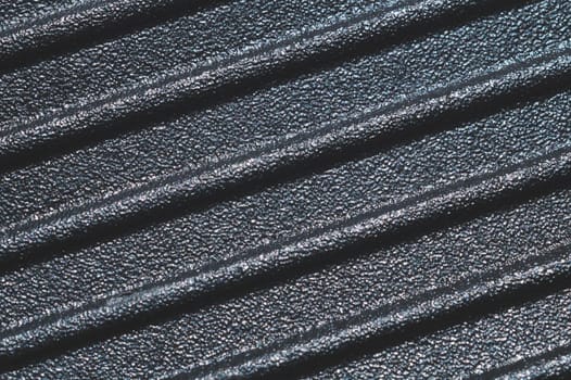Black plastic texture. ribbed background