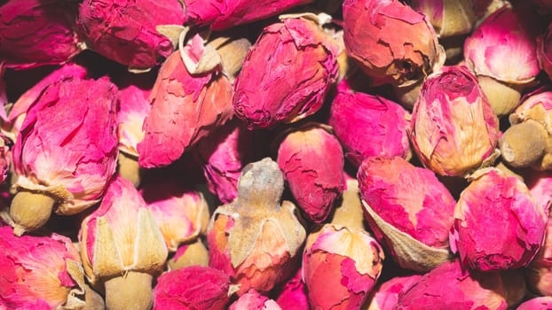 Dried rose buds close up. herbal tea ingredient