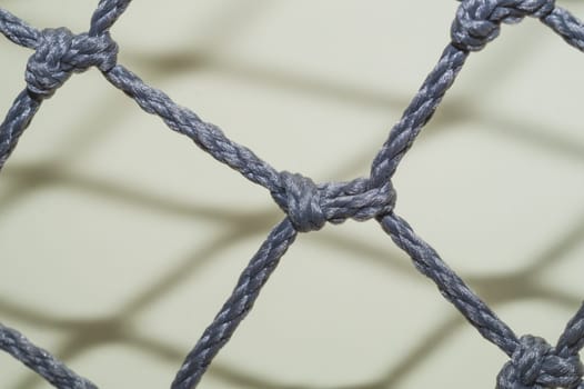 Rope net close up. mesh with knots and weaving