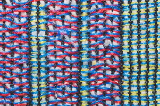 Colorful knitted wool background. woolen fibers close up