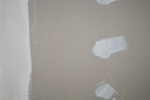 Plasterboard wall putty stains. prepared wall for renovation
