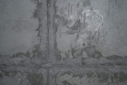 Concrete wall with cracks and scratches. abstract gray background with patterns. wall is ready for renovation works