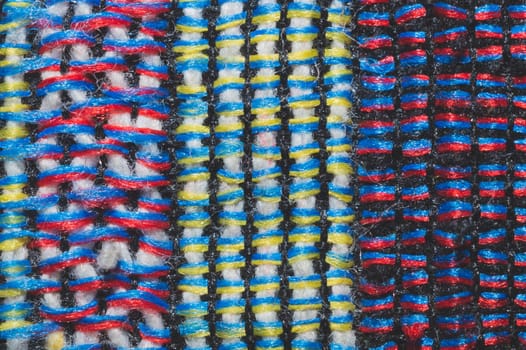 Colorful knitted wool background. woolen fibers close up