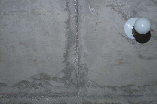 Concrete wall with cracks and scratches. abstract gray background with patterns. wall is ready for renovation works