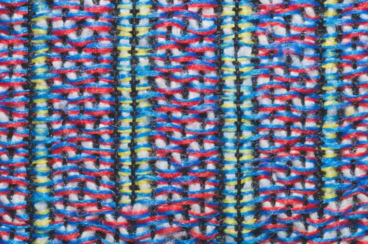 Colorful knitted wool background. woolen fibers close up