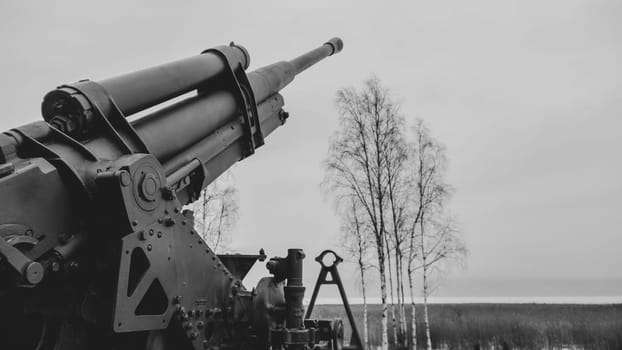 Artillery cannon monument. ancient howitzer. black and white