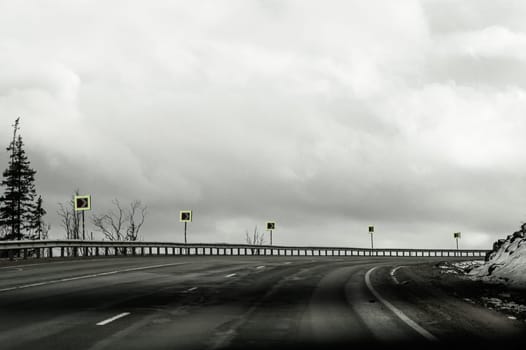 Roadway turn with road signs. highway background