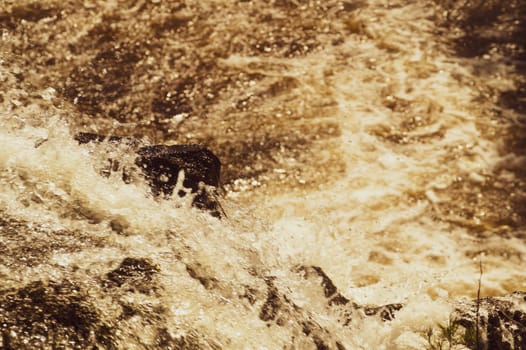 Waterfall nature background. rushing stream water. rocky flowing river