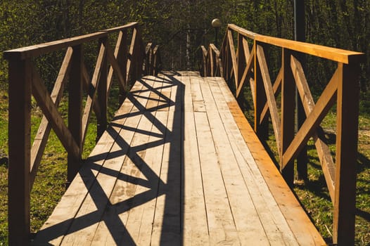 Wooden staircase in the park. stairway made from the wood in the forest