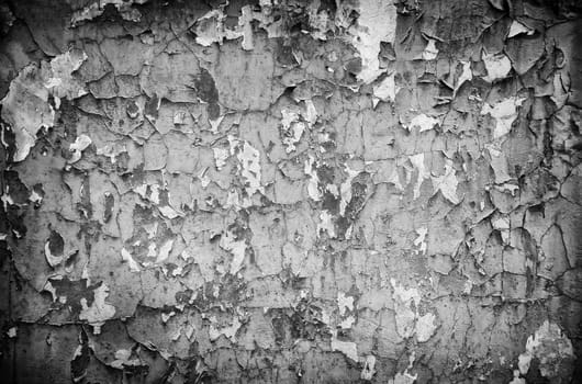 Detail of old damaged and ruined paint, abandonment and passage of time