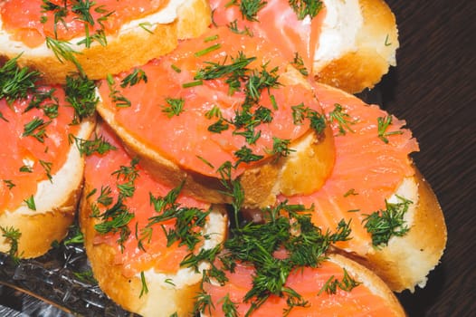 Smoked salmon sandwich. red fish appetizer