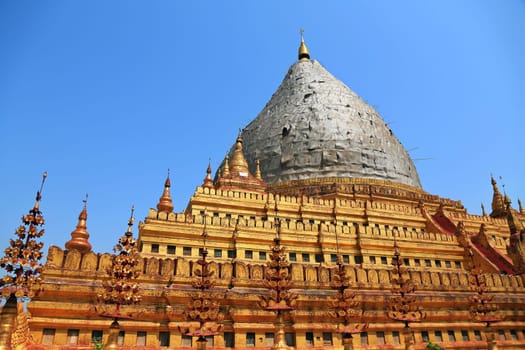 In Nyaung-U, Myanmar, visit the amazing Shwezigon Pagoda