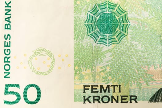 Fifty norwegian kroner close up. detail of norwegian banknote macro