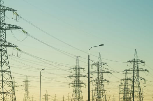 Power line posts. high voltage tower with the sky. industrial background