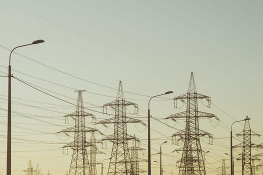 Power line posts. high voltage tower with the sky. industrial background