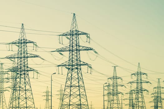Power line posts. high voltage tower with the sky. industrial background