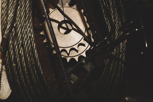 Metal circular saw hanging between wires. work tool. carpentry instrument