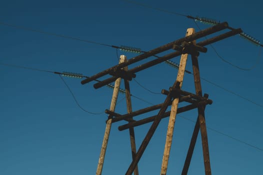 Power line post. high voltage tower with the sky. industrial background
