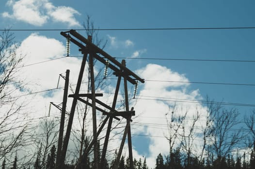 Power line post. high voltage tower with the sky. industrial background