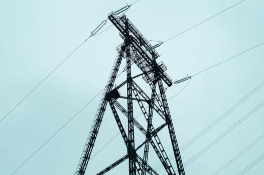 Power line posts. high voltage tower with the sky. industrial background
