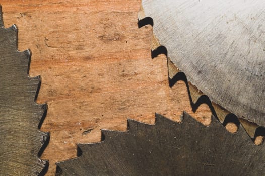 Circular saw blades. carpentry tools. industrial background. equipment for sawmill and sawing wooden products
